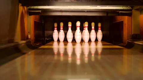Bowling ball knocking pins on the bowling lane Stock Footage 81188458