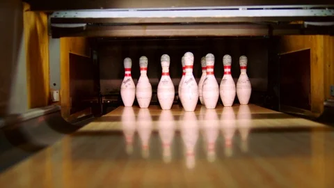 Bowling ball knocking pins on the bowling lane. Slow motion Stock Footage 81238327