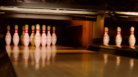 Bowling ball knocking pins on the bowling lane. Strike. Slow motion Stock-Footage 81246072