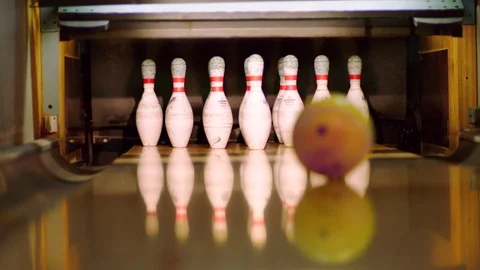 Bowling ball knocking pins on the bowling lane. Slow motion Stock-Footage 81247711