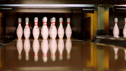 Bowling ball knocking pins on the bowling lane. Slow motion Stock-Footage 81254480