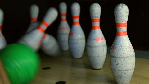 Bowling ball knocks down bowling pins in slow motion reflection destroy alley 스톡 동영상 105266408