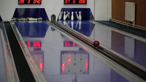 Bowling ball on the lane to knock down the pins Video stock 278488656