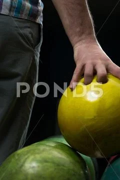 Bowling ball ready to throw some of you guys Stock Photos