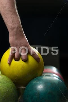 Bowling ball ready to throw some of you guys Stock Photos