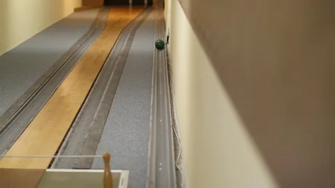 Bowling ball return machine at bowling alley Stock Footage 73466462