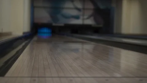 Bowling ball rolling on the track Stock Footage 99044268