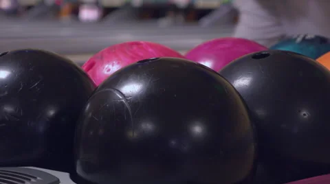 Bowling balls sitting at return station at alley 4k Stock Footage 54662002