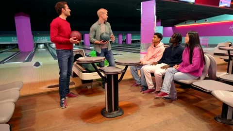 Bowling instructor explaining bowling technique to students Stock Footage 308262202