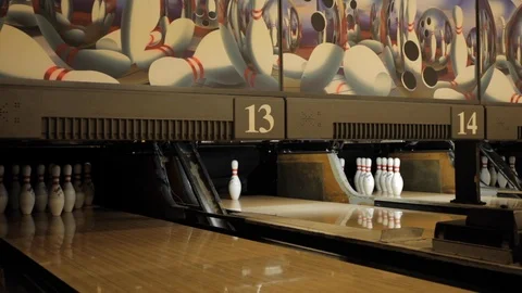 Bowling Pins being Knocked Down Stock Footage 114016239