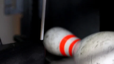 Bowling pins falling out of sorting lift Stock Footage 123394519