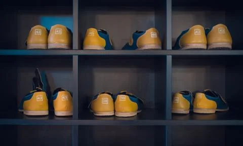 Bowling Shoes on a shelf Stock Photos