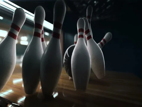 Bowling strike, bowling ball knocks down bowling pins in slow motion Stock Footage