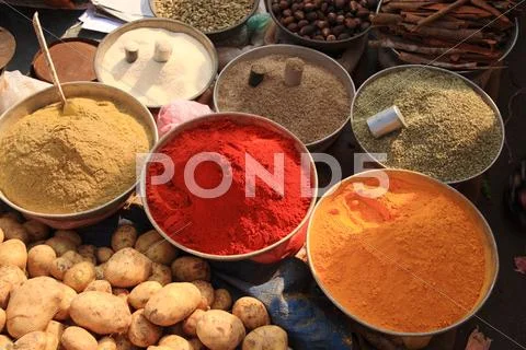 Bowls of cooking spices in indian market Stock Photos