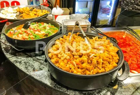 Bowls of hot Chinese food Stock Photos