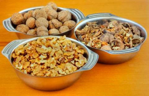 Bowls with walnuts Stock Photos