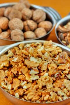 Bowls with walnuts Stock Photos