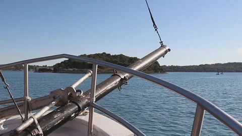 Bowsprit Of Yacht Is On Left Side. View Of Water From Bow Of Ship, Moving In Sea Stock Footage 242589838
