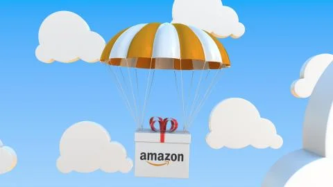 Box with AMAZON logo falls with a parachute. Editorial 3D rendering Stock Illustration