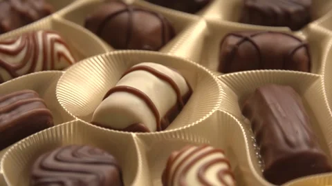 Box of assorted chocolates pralines with smooth rotation motion Stock Footage 264918542