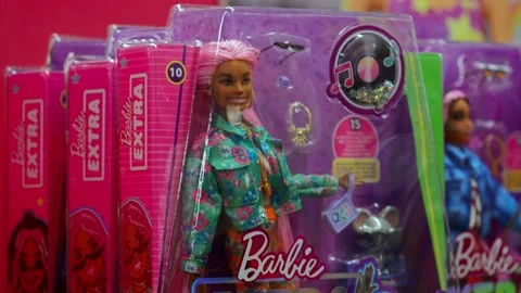 A box with a Barbie doll . Video stock 228999523