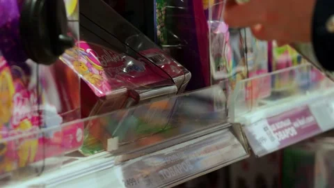 A box with a Barbie doll . Video stock 229295126