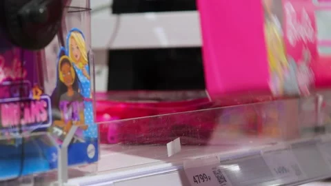 A box with a Barbie doll . Video stock 229295350