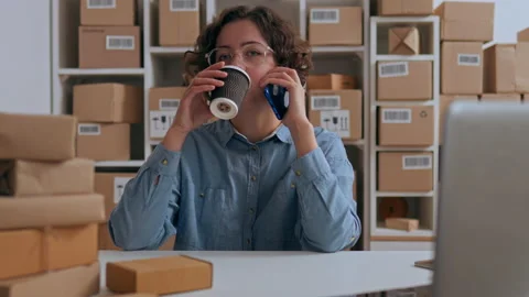 Box with barcode, Warehouse worker Slowly Making a phone call in the warehou Video stock 233513705