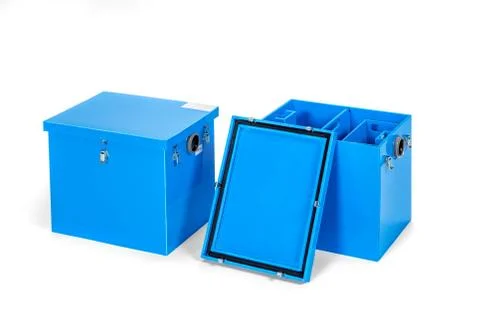 Box with blue fat trap system on white background. Stock Photos