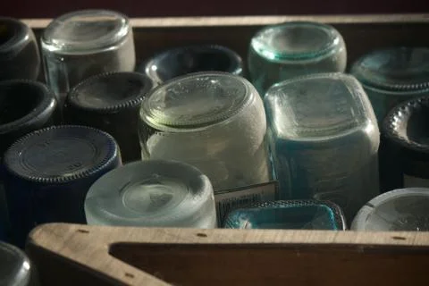 Box of bottle bottoms Stock Photos