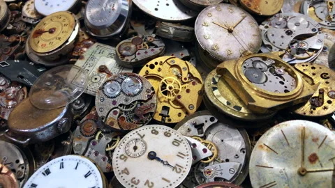A box of broken old vintage pocket and wrist watches. 4K static shot. Stock Footage 284672250