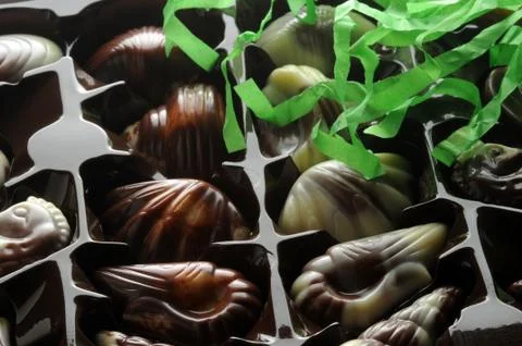 Box of chocolates with confetti Stock Photos