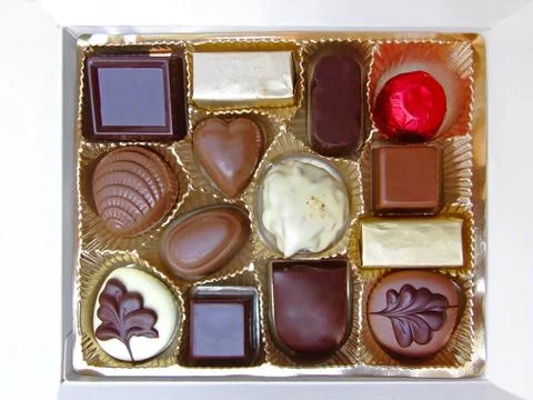 Box of chocolates Gift box of assorted chocolates with various fillings Co... Stock Photos