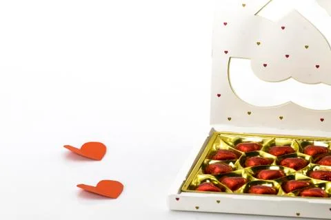 A box of chocolates in the shape of hearts Stock Photos