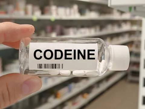 Box of CODEINE tablets on a hospital pharmacy table used to treat pain and cough Stock Photos