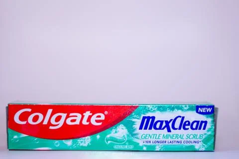 A box of Colgate max clean toothpaste against a white background Stock Photos