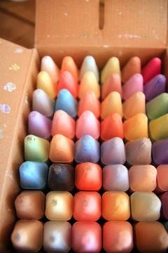A box of colored crayons not yet touched by babies Stock Photos