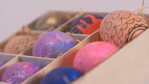 Box of Colourful Easter Eggs Rotating Video stock 129049083
