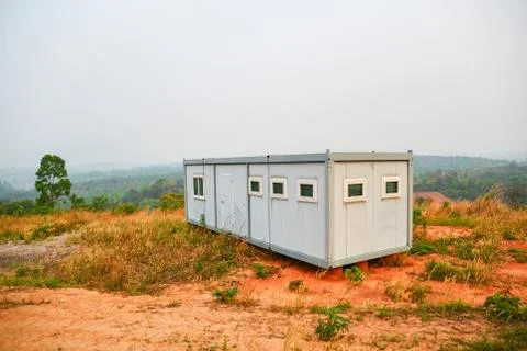 Box container office / Administration settlement office at industrial site Stock Photos