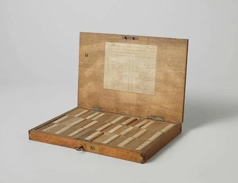 Box containing Twenty-Three Samples of Wood From Surinam. Rectangular box ... Stock Photos