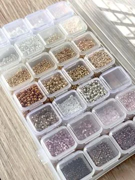The box of craft beads in case Stock Photos