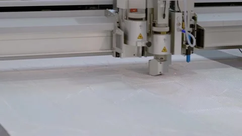 Box cutting and creasing plotter during work - cnc flatbed cutter during work Stock Footage 130599897