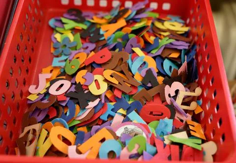 Box with different alphabet letters Stock Photos