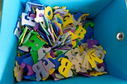 Box with different alphabet letters Stock Photos