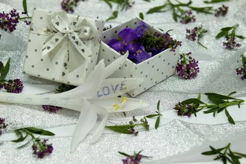 The box is filled with purple flowers on the surface covered Stock Photos