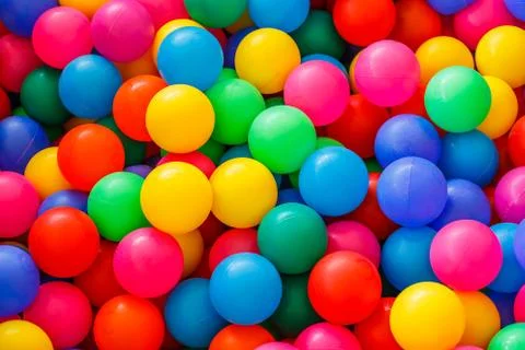 Box filled with small colored balls Fotos Stock