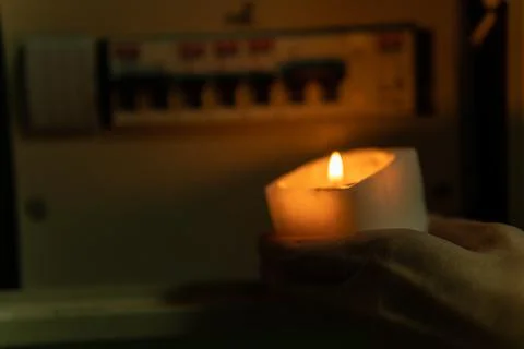 Box flame off shield dark wax repairman meter electricity, from, darkness Foto stock