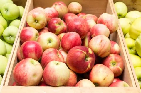 Box of fresh apples on display Stock Photos