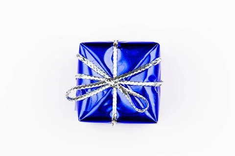 Box with gift on a white background with copy space for text. Blue boxes Stock Photos