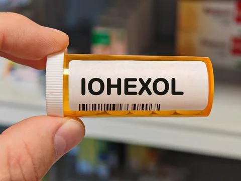 Box of IOHEXOL tablets on a hospital pharmacy table used as a radiographic Stock Illustration